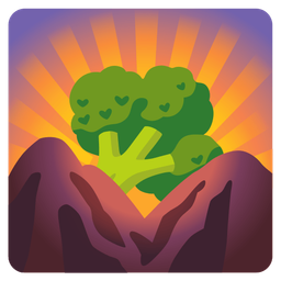 sunrise over mountains and broccoli