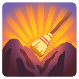 sunrise over mountains and broom