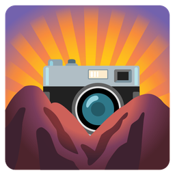 sunrise over mountains and camera