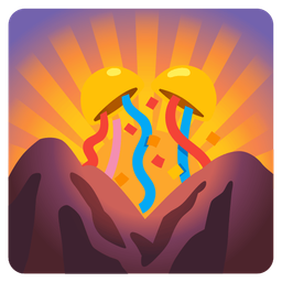 sunrise over mountains and confetti ball