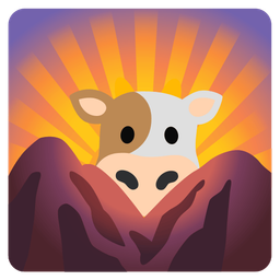 sunrise over mountains and cow face