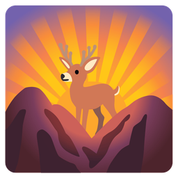 sunrise over mountains and deer