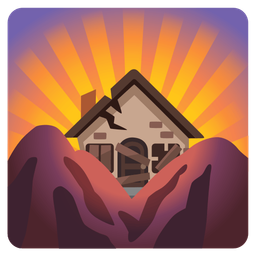 sunrise over mountains and derelict house