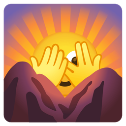 sunrise over mountains and face with peeking eye