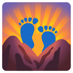 sunrise over mountains and footprints