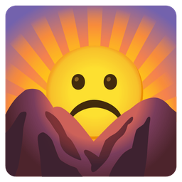 sunrise over mountains and frowning face