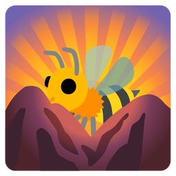 sunrise over mountains and honeybee