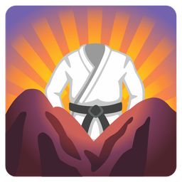 sunrise over mountains and martial arts uniform
