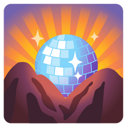 sunrise over mountains and mirror ball