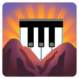 sunrise over mountains and musical keyboard