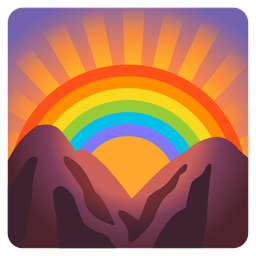 sunrise over mountains and rainbow