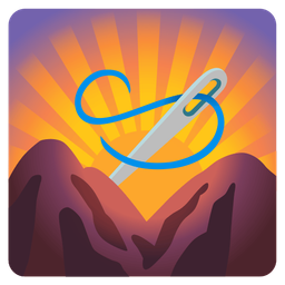 sunrise over mountains and sewing needle