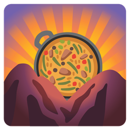 sunrise over mountains and shallow pan of food