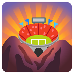 sunrise over mountains and stadium