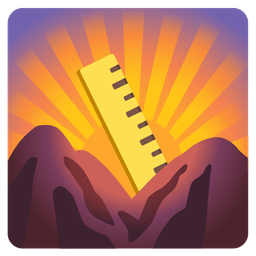 sunrise over mountains and straight ruler