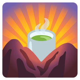 sunrise over mountains and teacup without handle