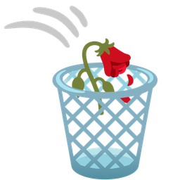 wastebasket and wilted flower
