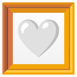 white heart and framed picture